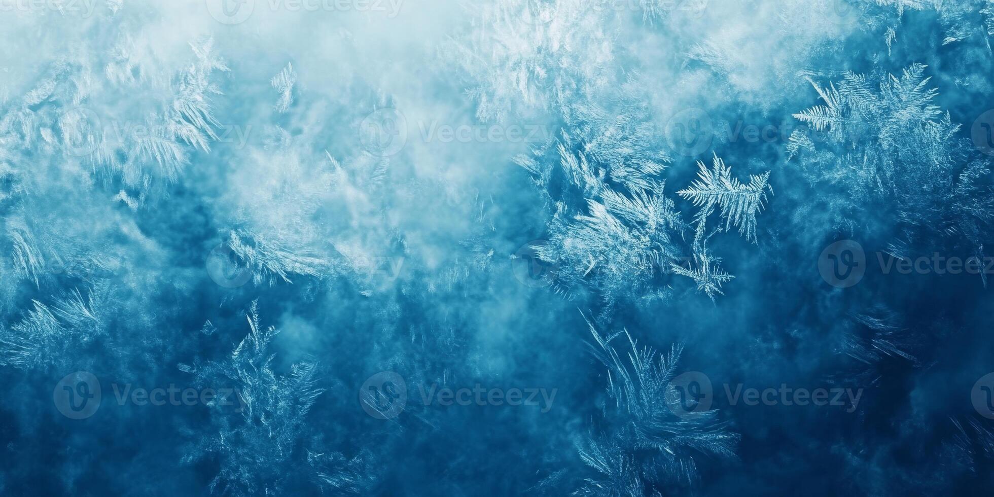 This closeup photograph of frost on a window captures intricate icy formations and a soothing blue hue, creating a chilly winter atmosphere that enhances the beauty of natures frozen artistry photo