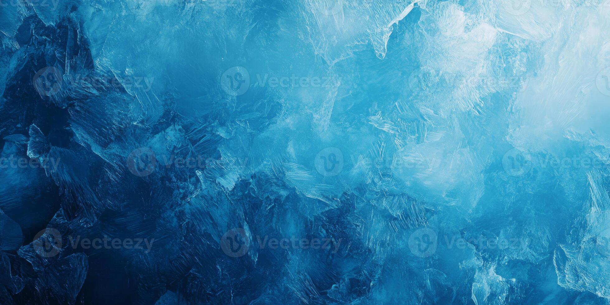 This icy blue texture showcases intricate frost patterns, evoking the enchanting winter season. Its perfect for cool backgrounds and designs, making it ideal for artistic projects photo