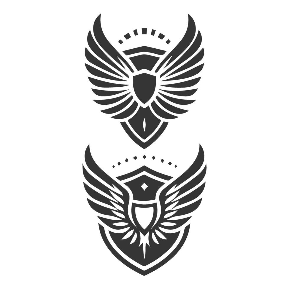 Two black and white wings on a shield vector