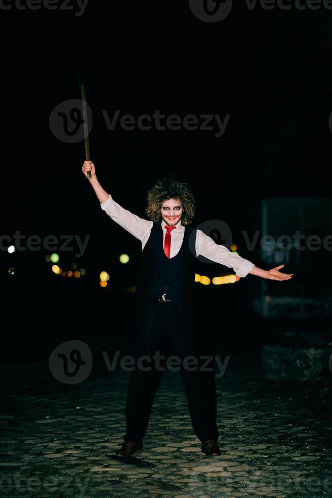 A mysterious figure, disguised as an assassin in a suit with wild hair, wields a menacing axe, embodying the very essence of fear and danger photo
