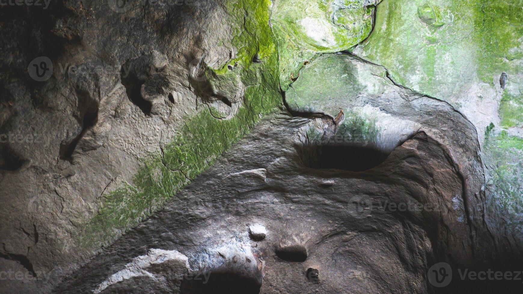 Views of uplistsikhe ancient rock town in country of Georgia stone walls photo