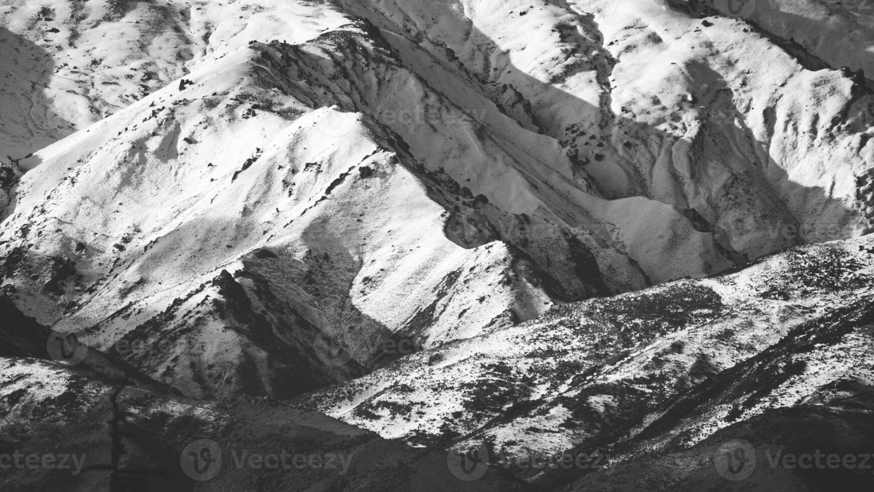 Snow covered mountains close up in Alexandra new Zealand iconic scenery photo