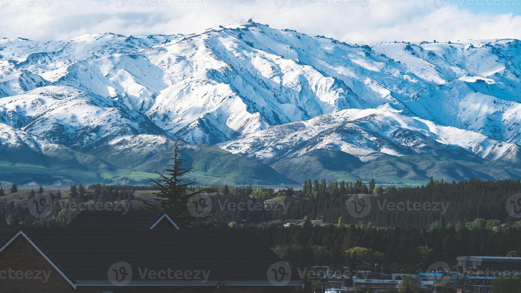 Snow covered mountains close up in Alexandra new Zealand iconic scenery photo