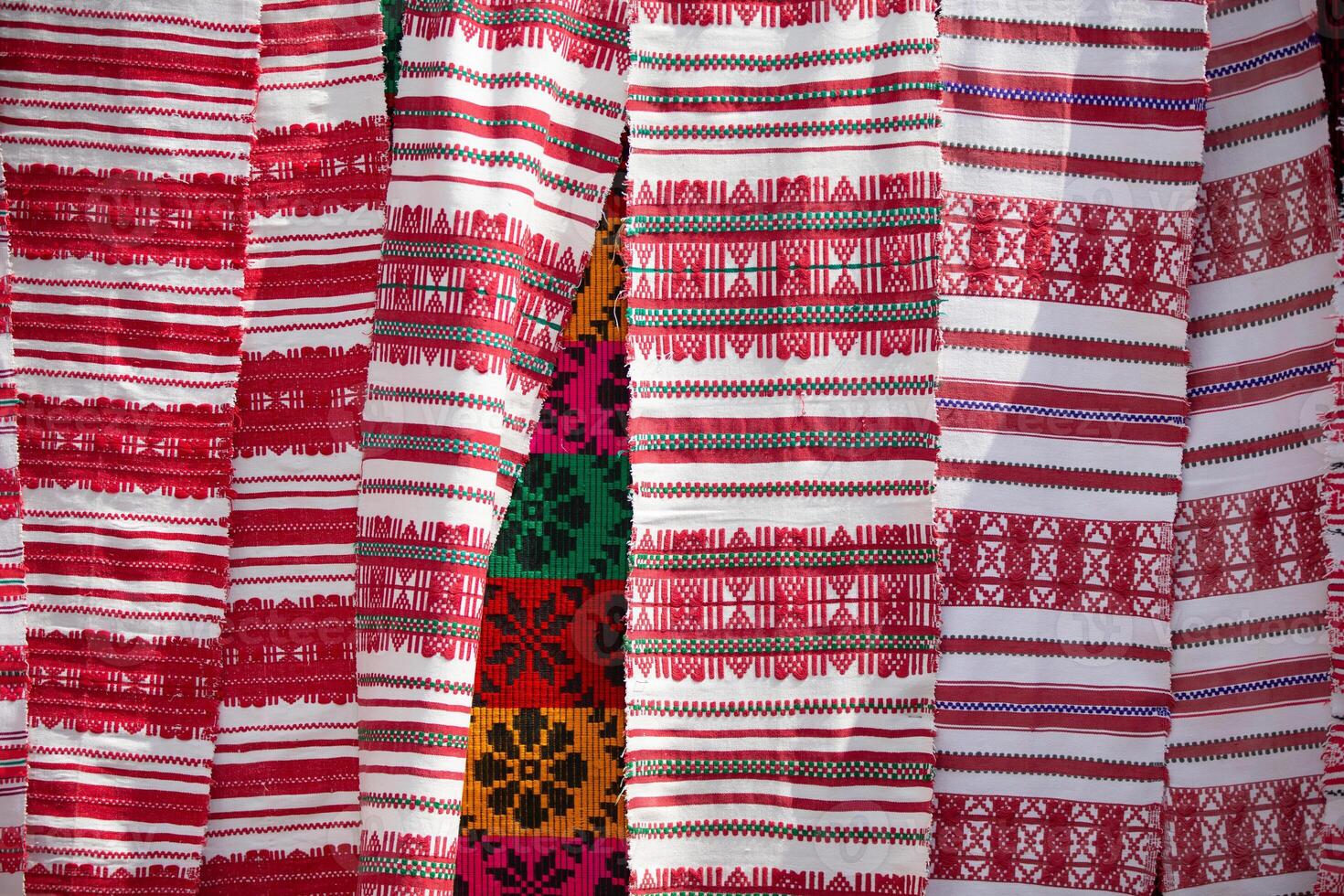 Slavic embroidered towels with ethnic patterns. National Belarusian or Ukrainian pattern on fabric. photo