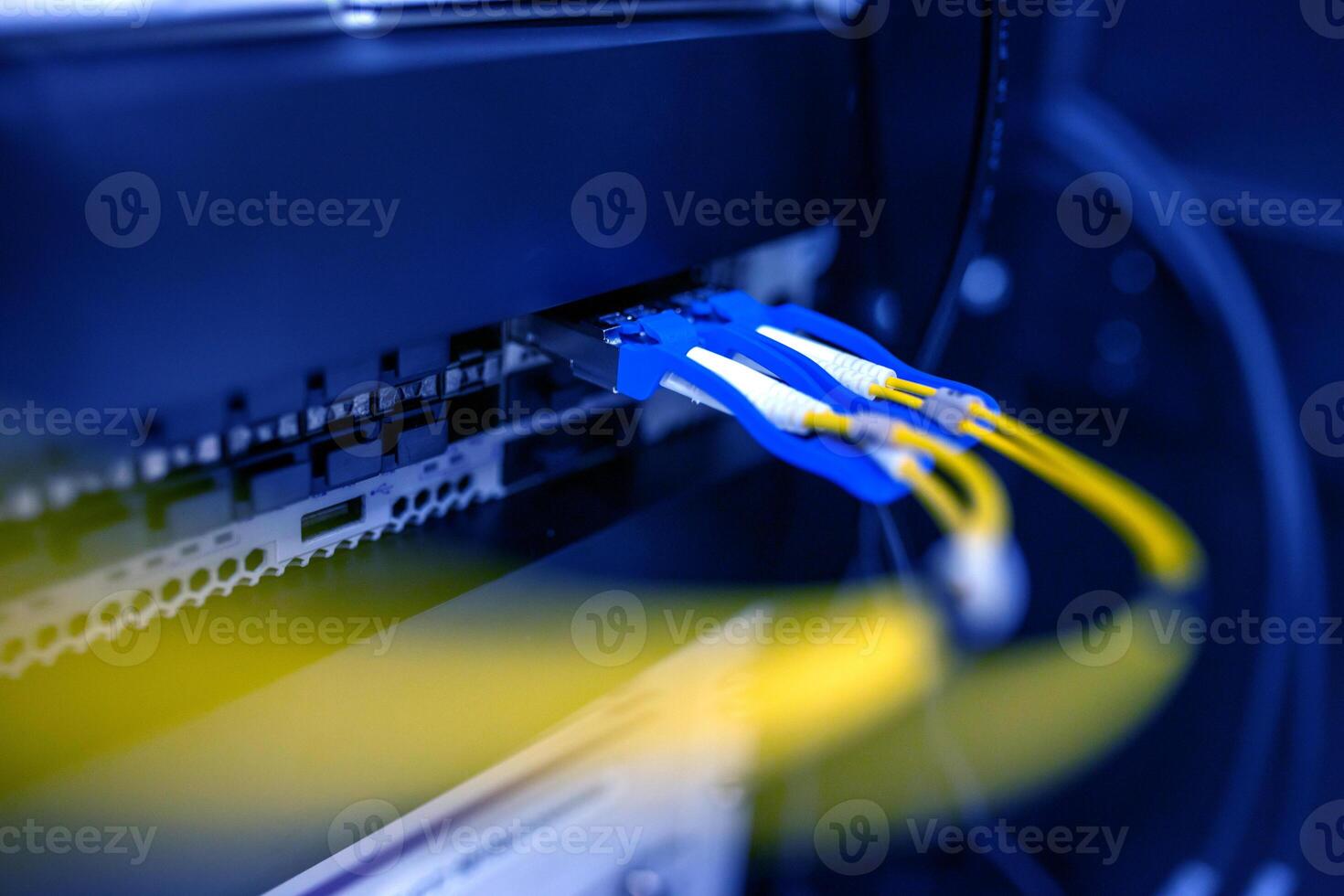 A close up of a yellow and blue cable photo