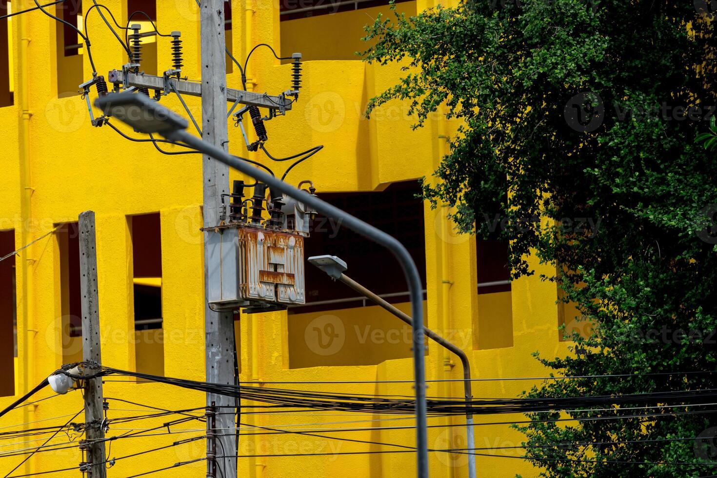 A yellow building with a clock on it photo