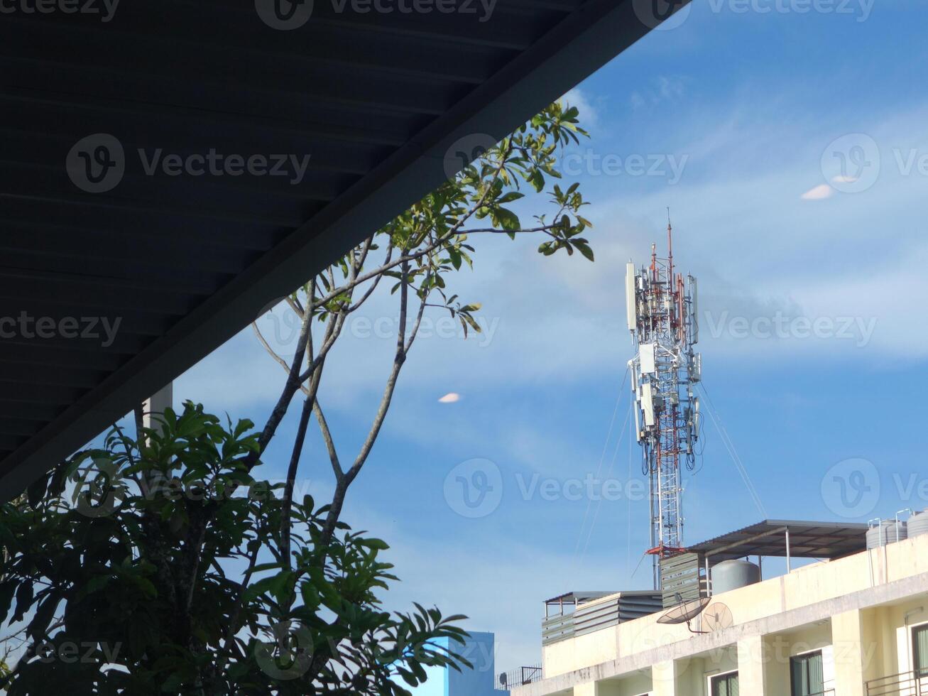 A building with a cell phone tower photo