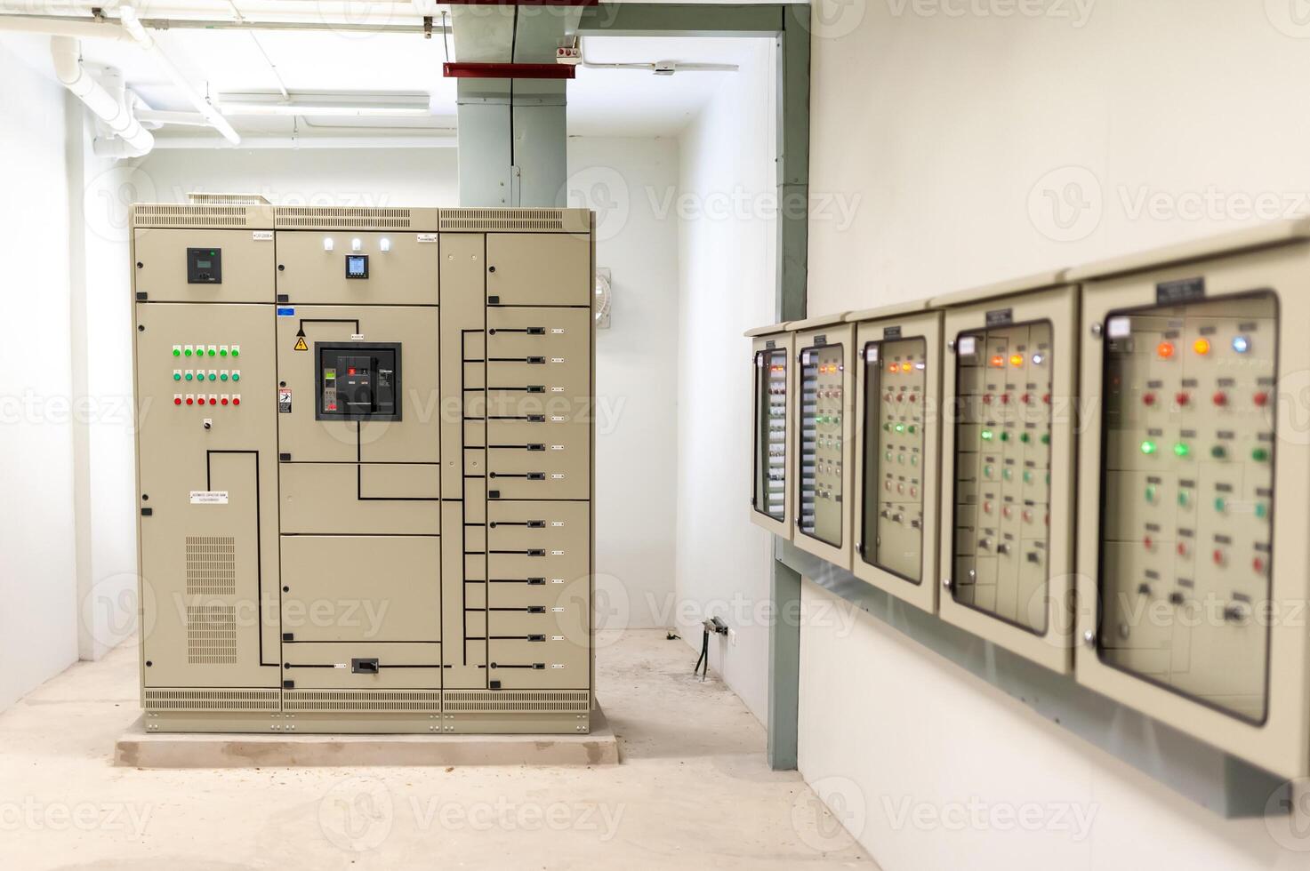 A large electrical panel in a room with several switches photo