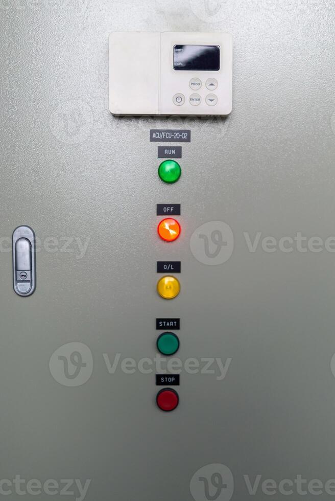 A control panel with several buttons and lights photo