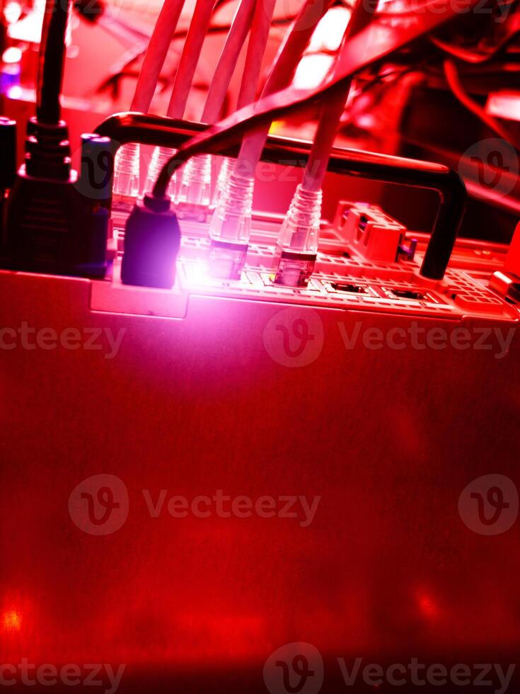 A red light is shining on a computer photo