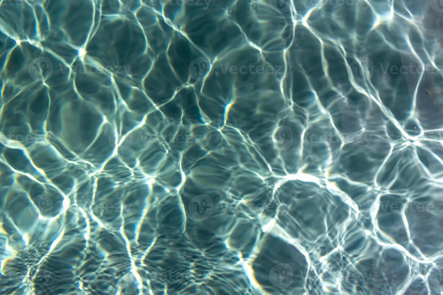 A close up of a pool with water photo