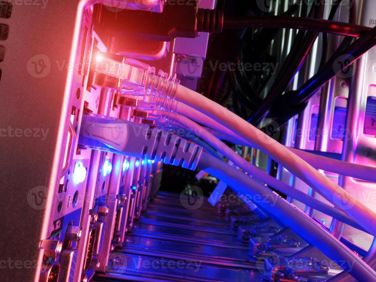 A close up of a computer with many wires photo