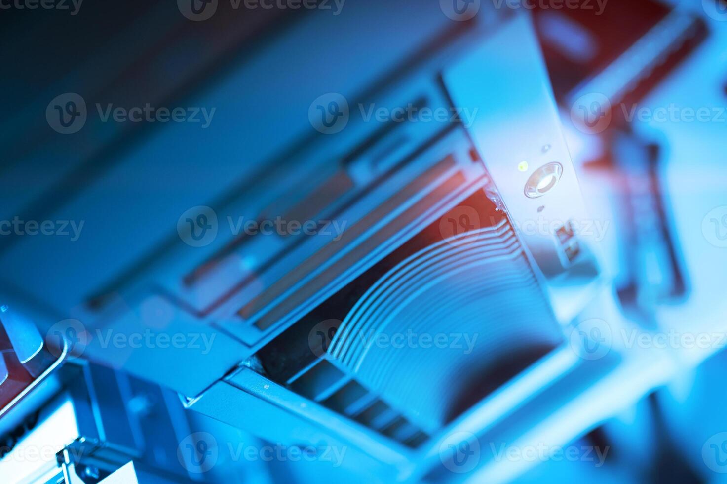 A close up of a computer with a blue light photo