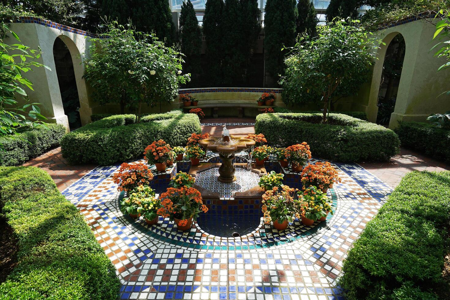 Architecture of terrace patio and natural fountain decorated in Climatron geodesic conservatory dome at Missouri Botanical garden- St.Louis town, MO photo