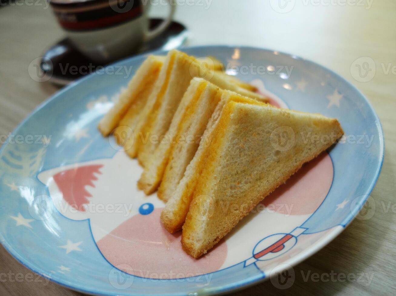 A plate with a sandwich on it photo