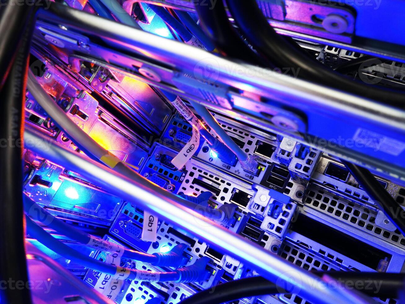 A close up of a computer with many wires photo