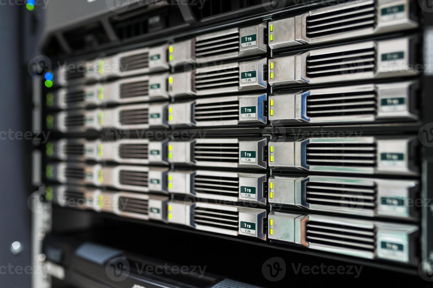 A server rack with many different types of servers photo