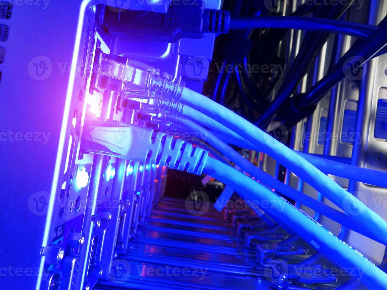 A close up of a computer server with blue lights photo