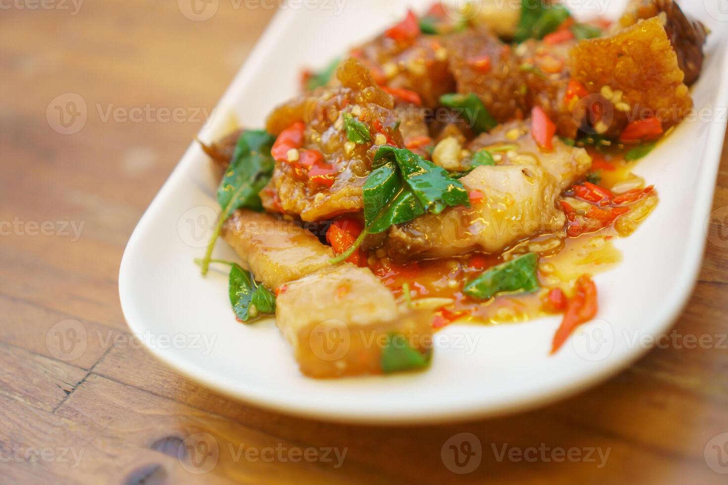 A plate of food with some vegetables and meat photo