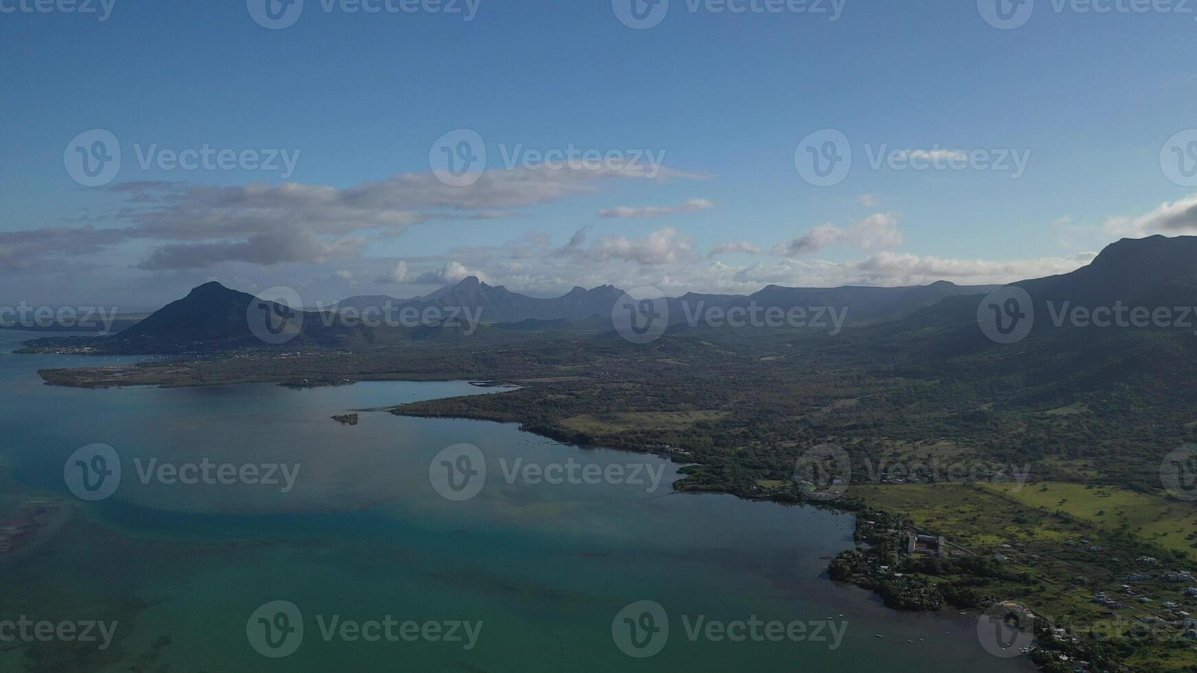 top view of the coast of Mauritius, mountains and the Indian ocean photo