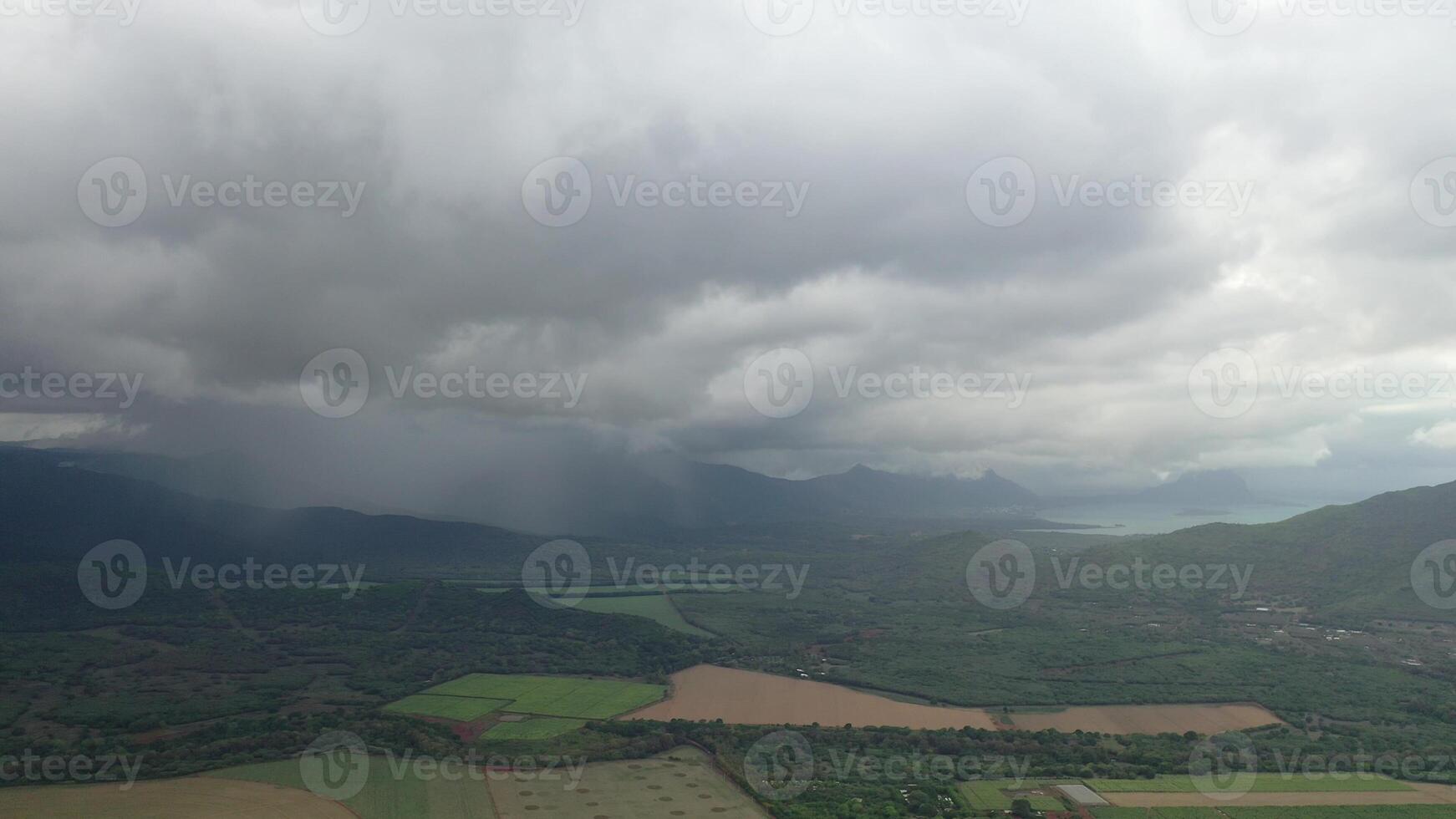 top view of rural fields and rain in the distance, Mauritius photo
