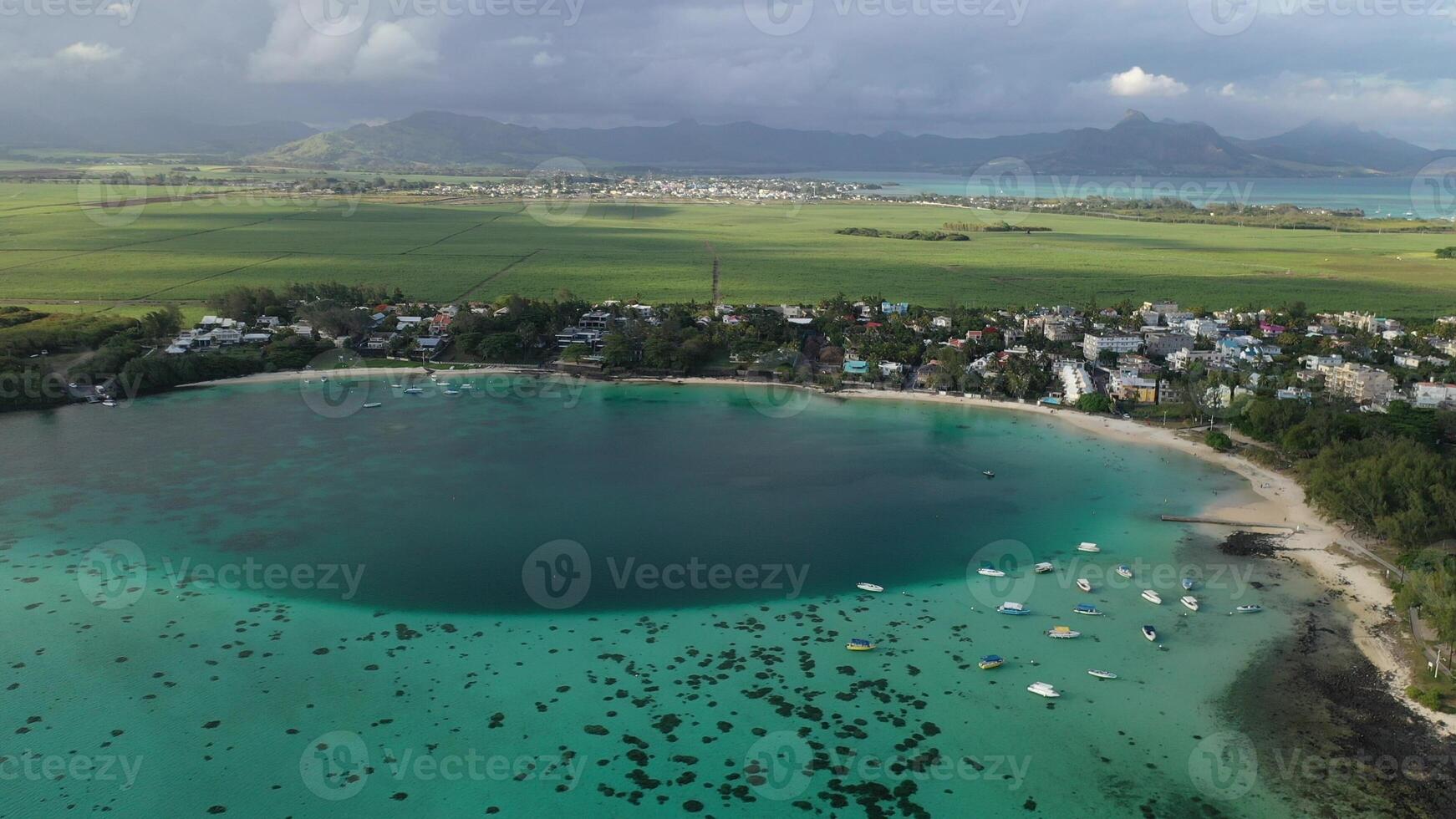 The view from the height on the beautiful beach of blue Bay with boats, Mauritius, photo