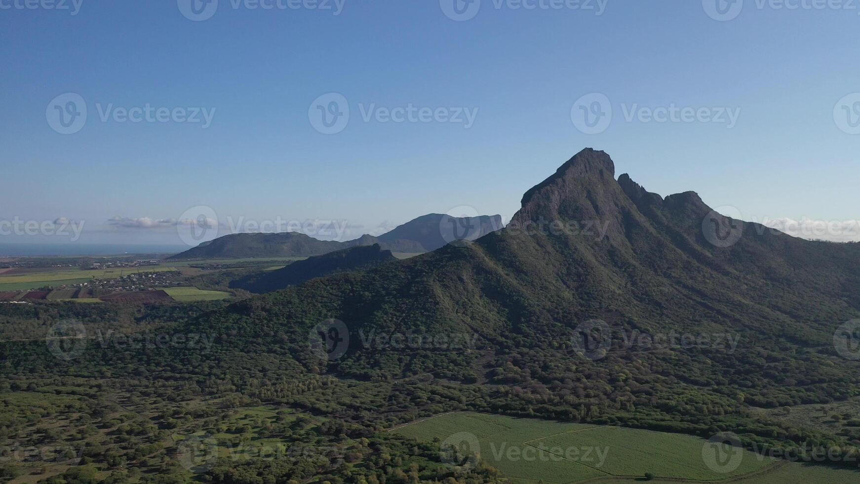 bird's eye view of mountain peaks and green jungles of Mauritius, Africa photo