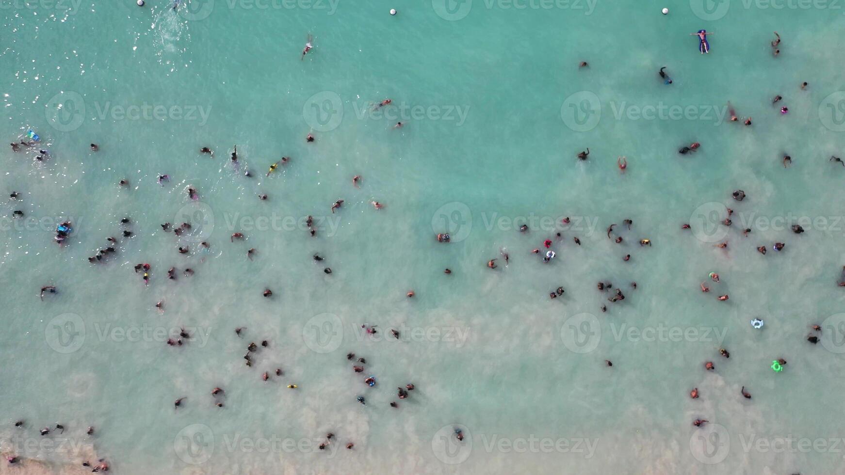 the island of Mauritius, bathing locals in the Indian ocean photo
