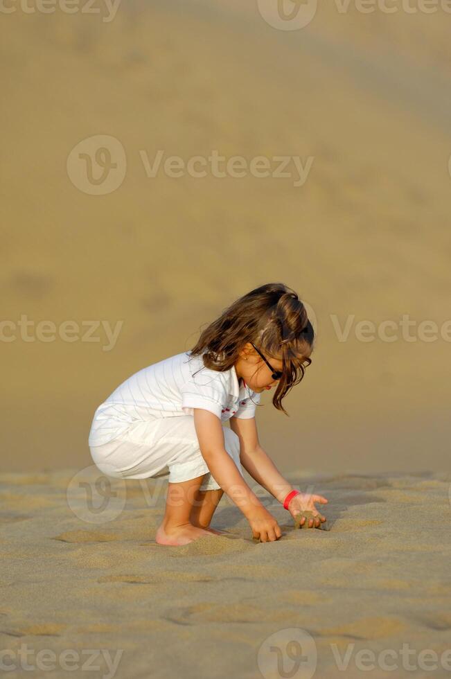 Child in desert photo