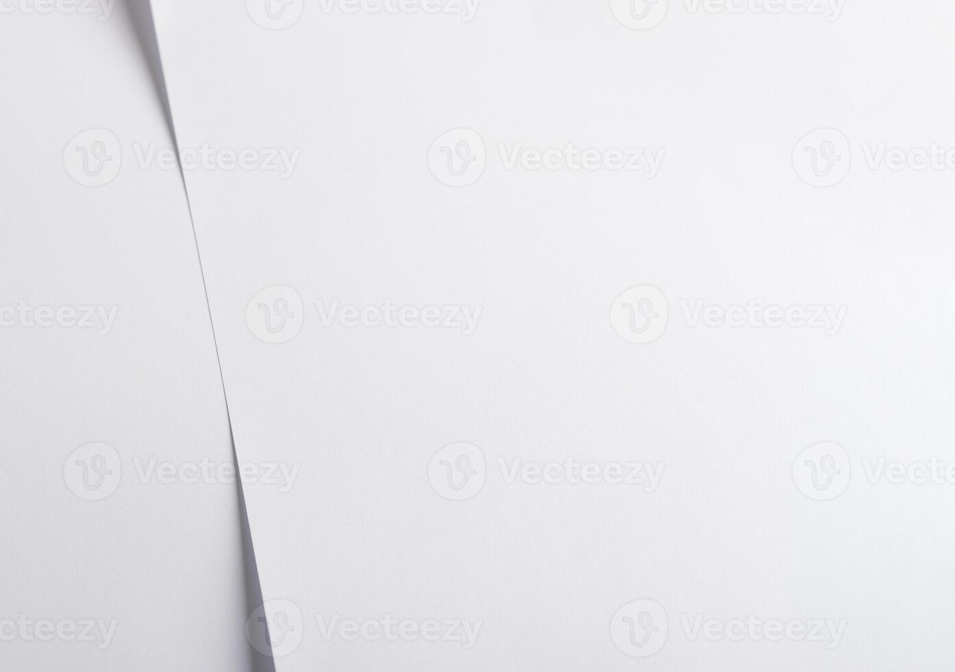 Elegant designer paper background with a soft, pearlescent white tone and subtle gloss. This photo