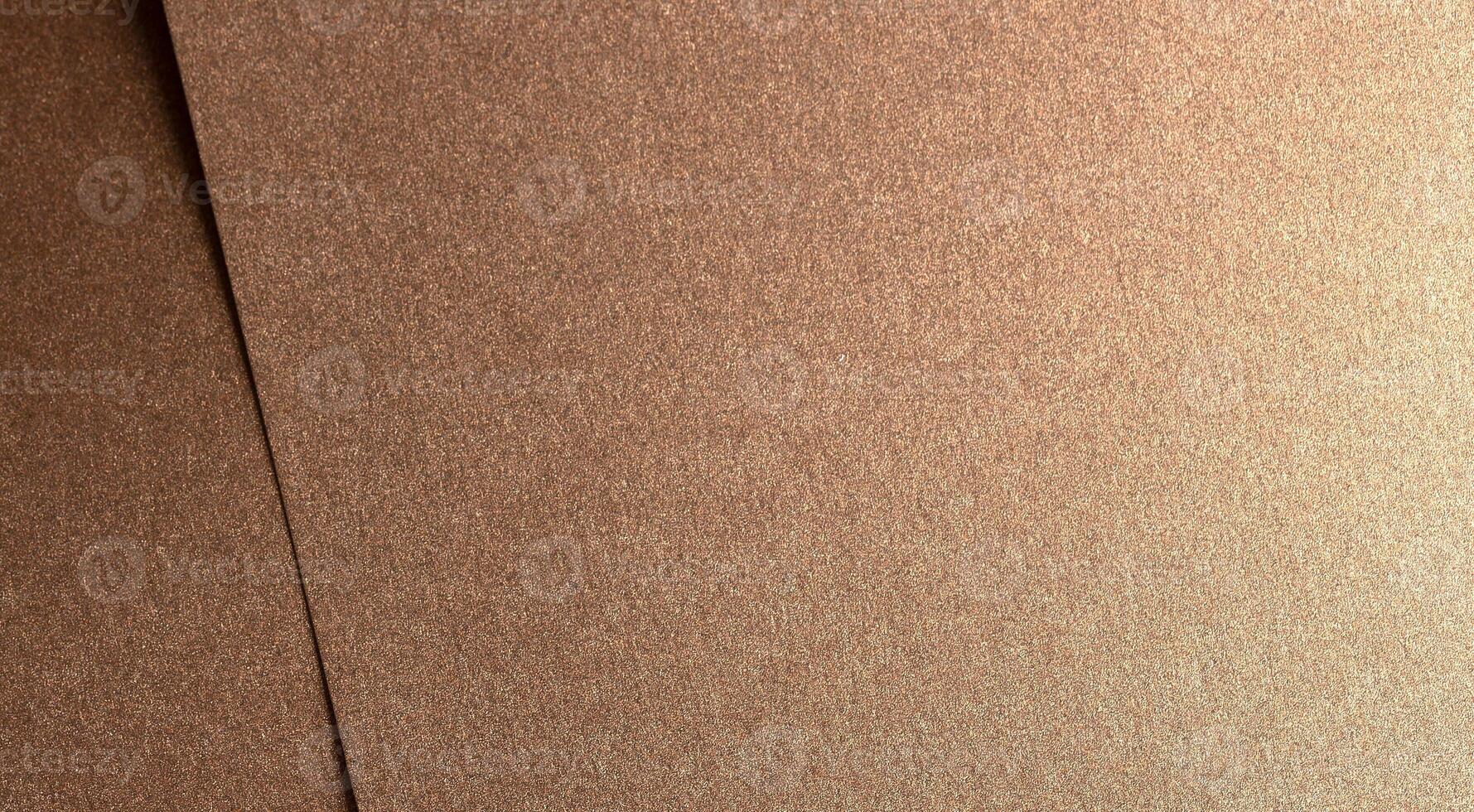 Glossy bronze designer paper with a shining, metallic gradient and textured finish. Elegant and photo