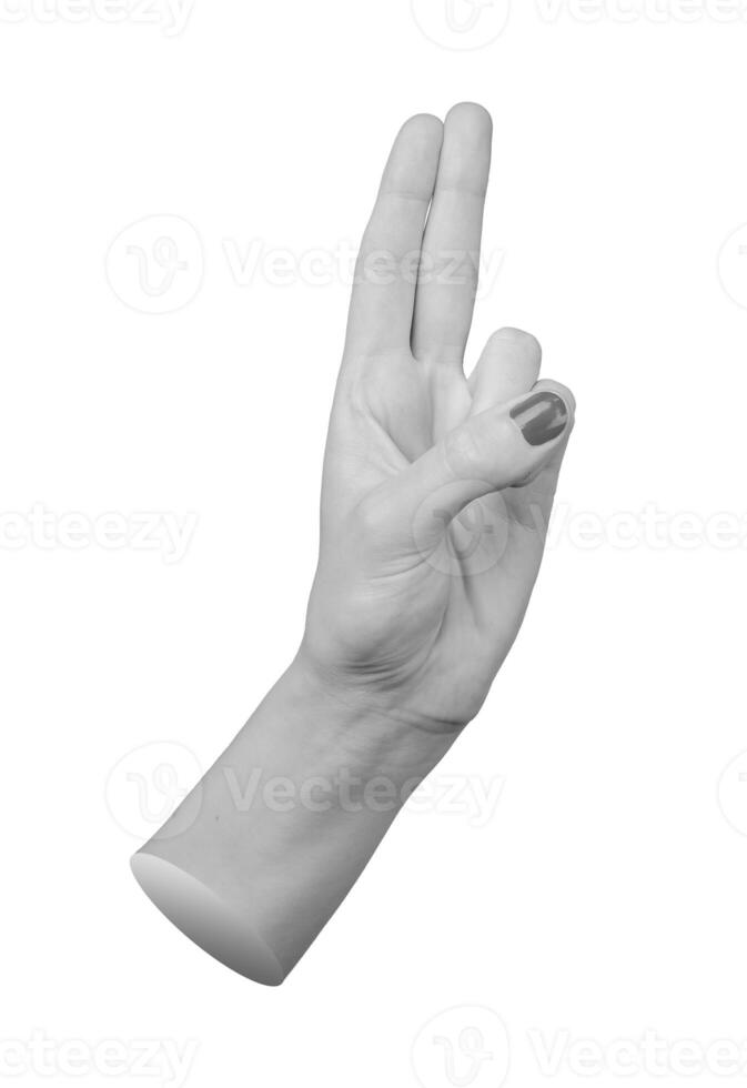 hand with the thumb resting on the pinky and ring fingers, while the index and middle fingers are photo