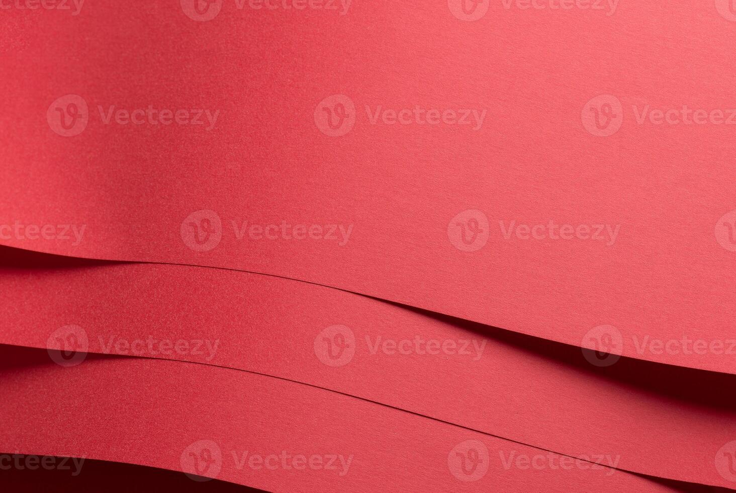 Paper texture background. Premium abstract surface with vibrant red shade, crimson and scarlet tones photo