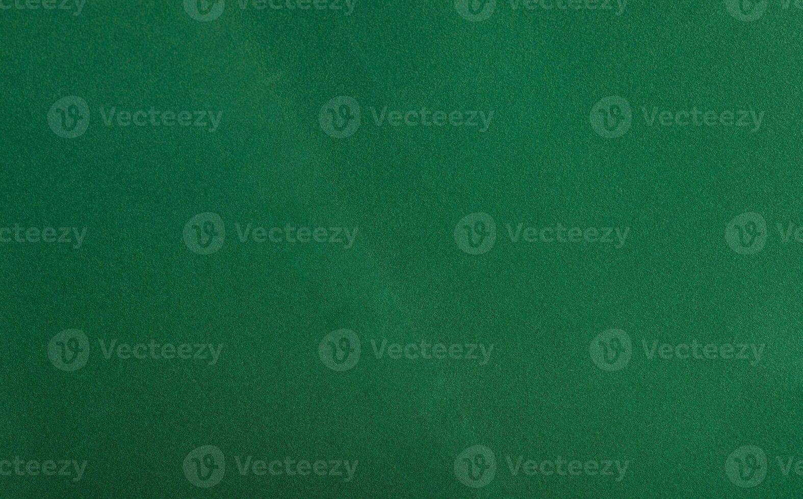 Paper texture background. Premium sheet with elegant, deep emerald shade and monochrome design. photo