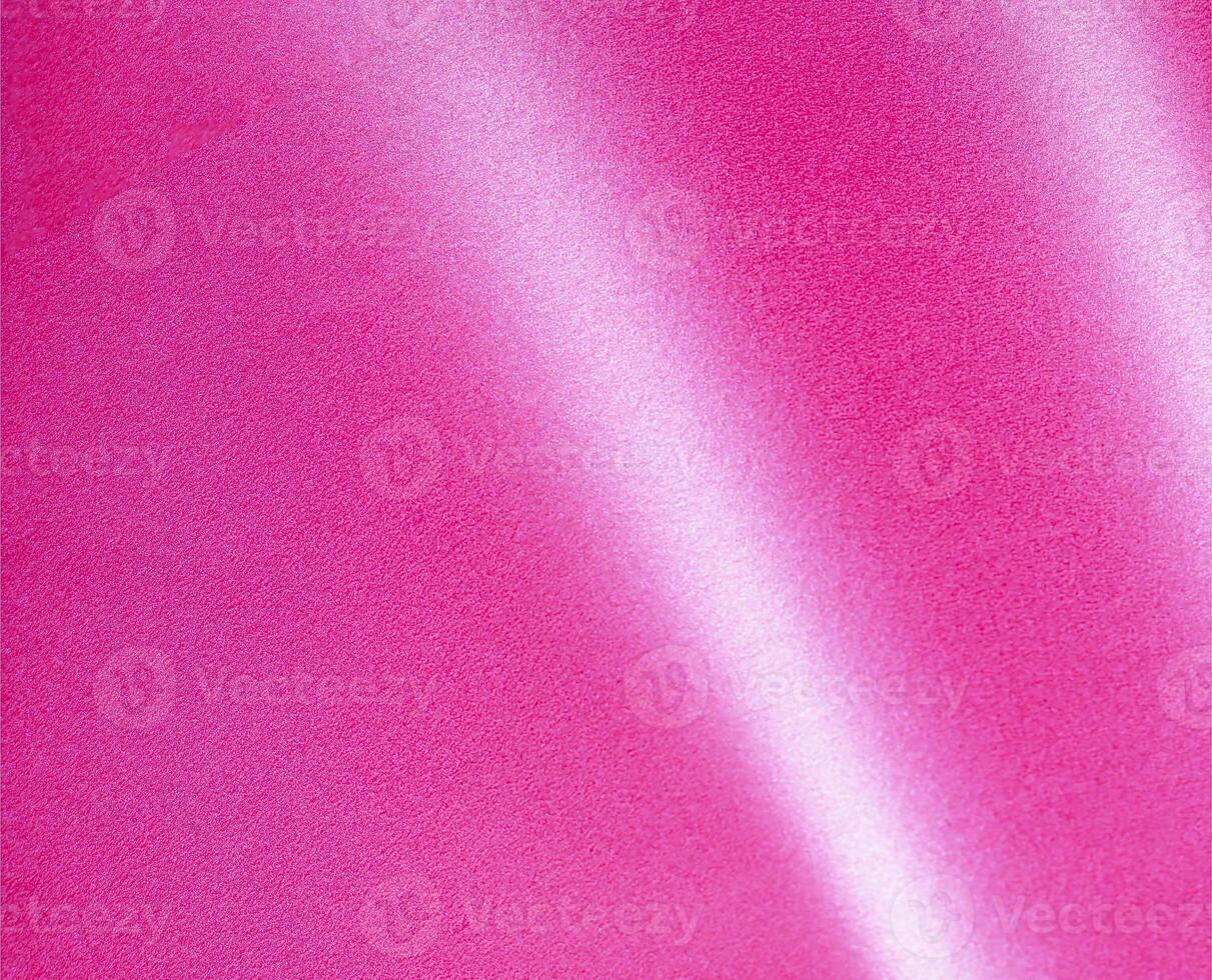 Glossy pink background with a bright, shiny texture and soft shimmer, creating a stylish and modern photo