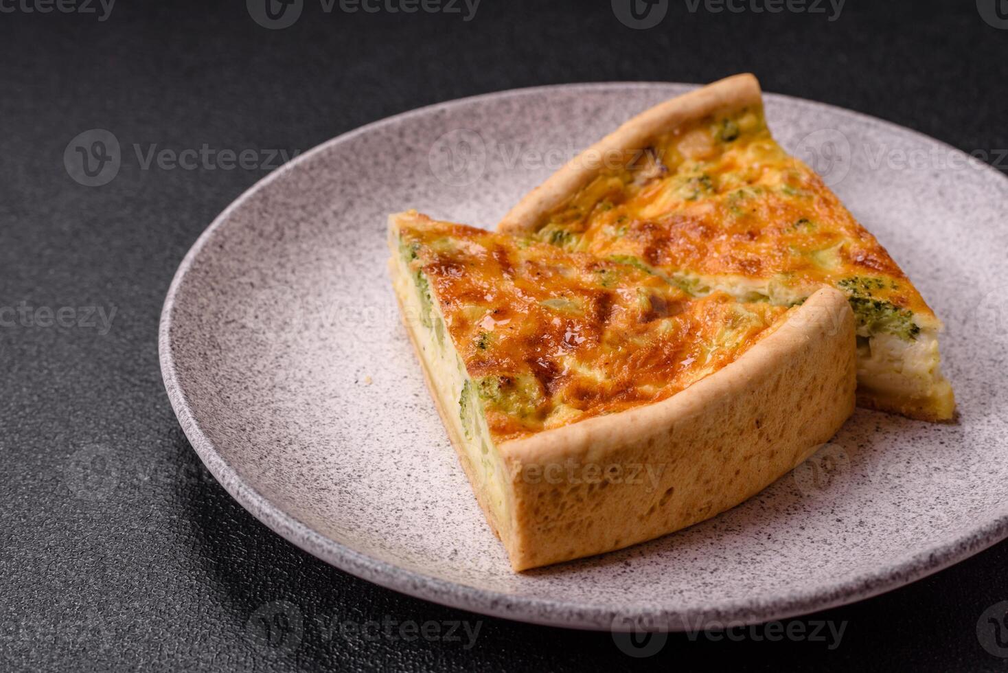 Delicious quiche with broccoli, chicken or salmon and cheese photo
