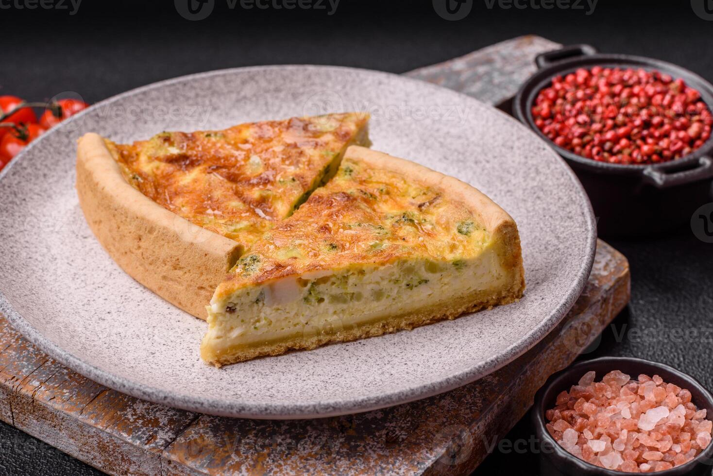 Delicious quiche with broccoli, chicken or salmon and cheese photo