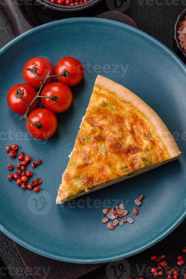 Delicious quiche with broccoli, chicken or salmon and cheese photo