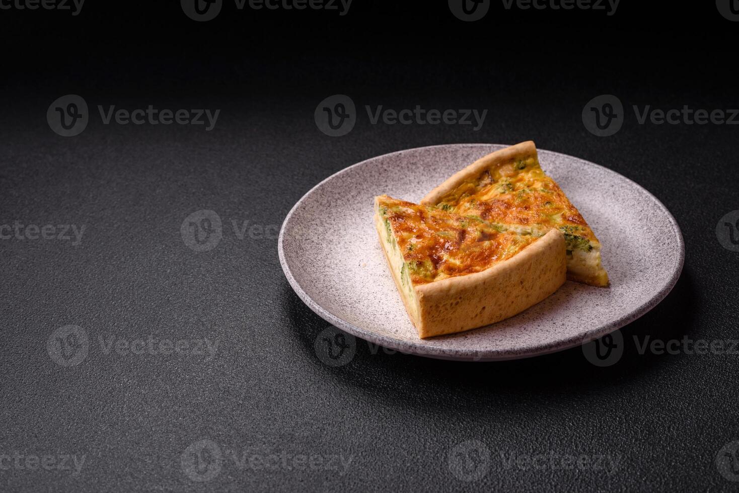 Delicious quiche with broccoli, chicken or salmon and cheese photo