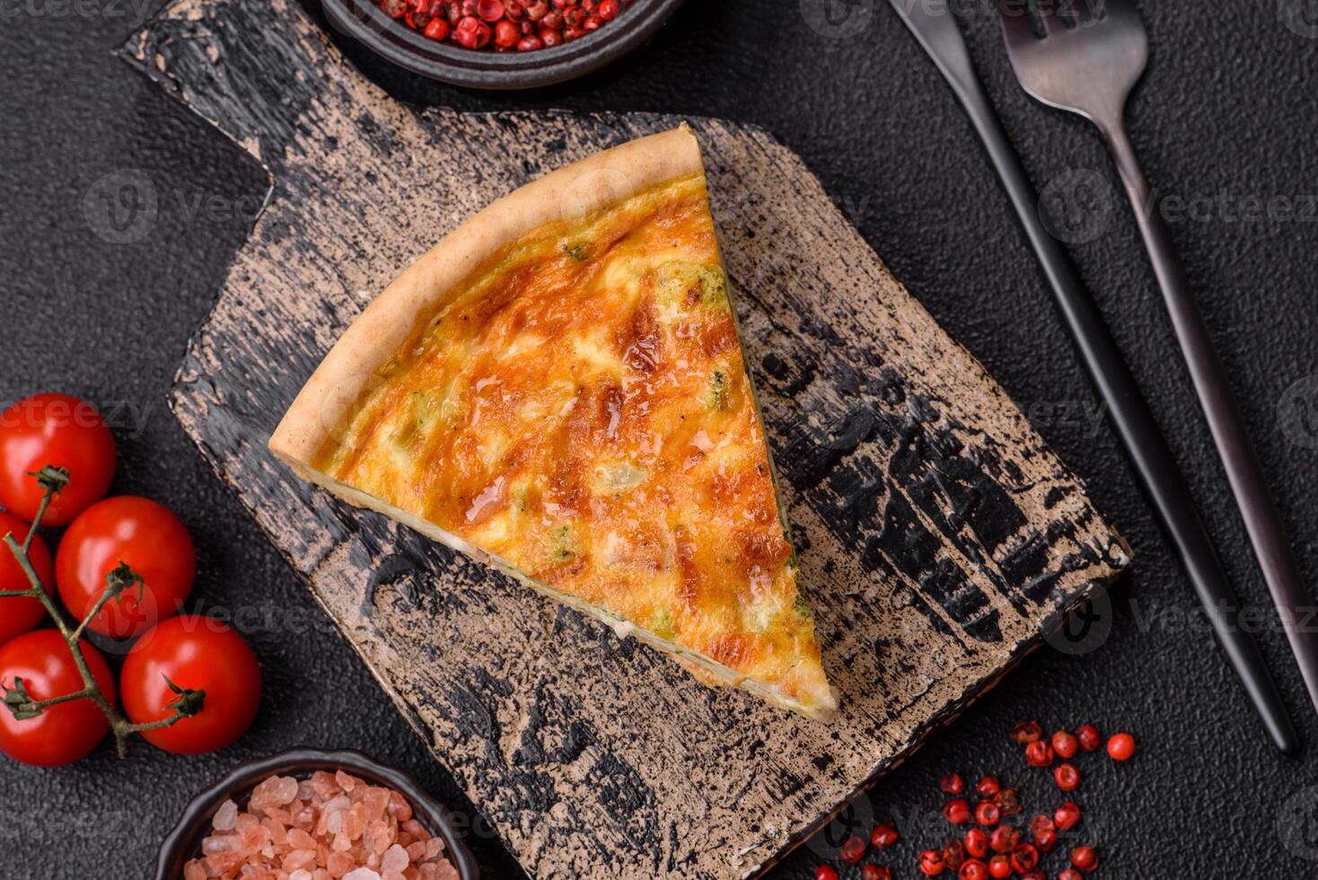 Delicious quiche with broccoli, chicken or salmon and cheese photo