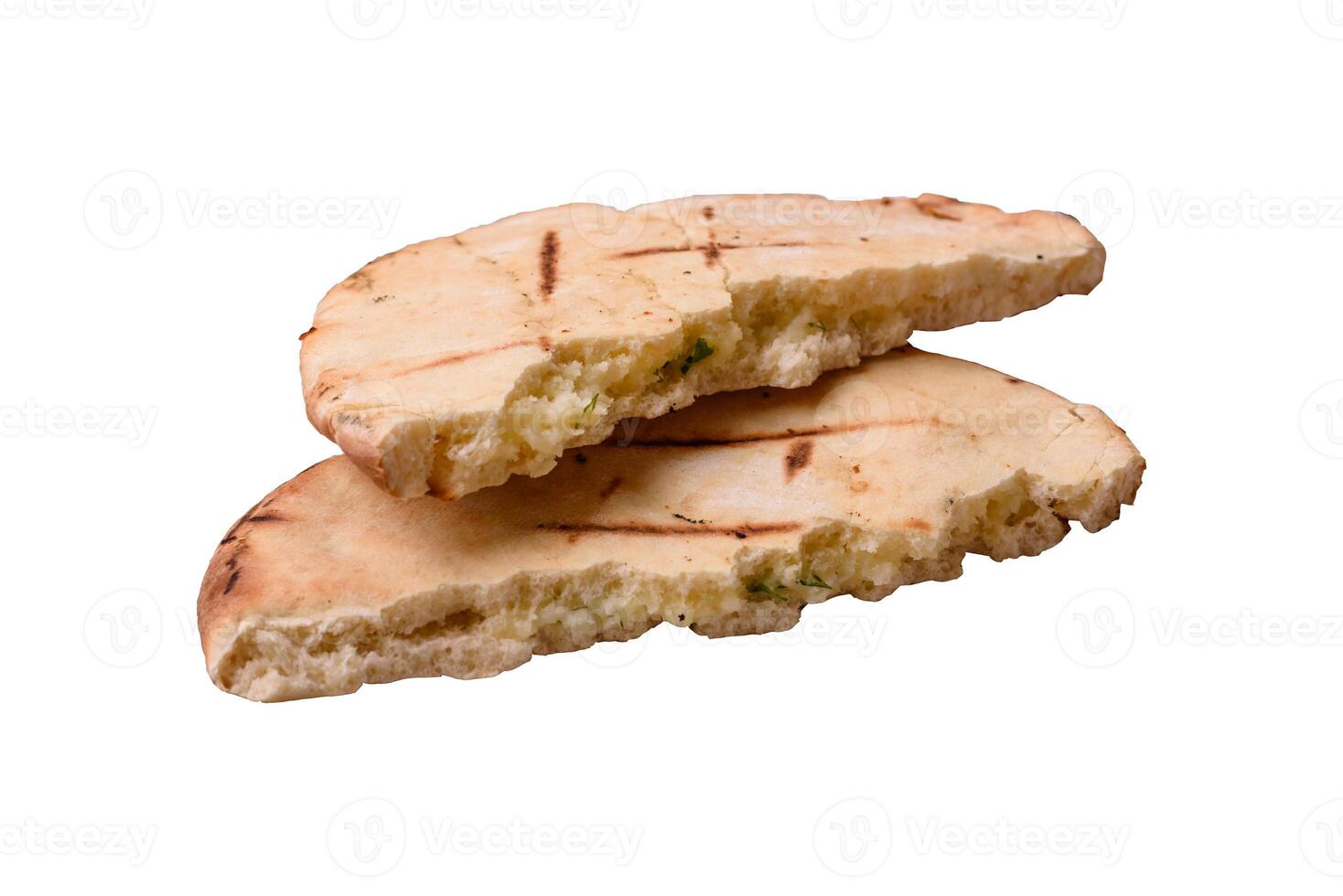 Round flatbread or pita with cheese, herbs, salt and spices photo