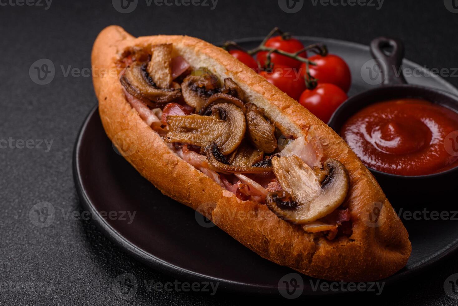 Hotdog with grilled sausage with bacon and mushrooms photo