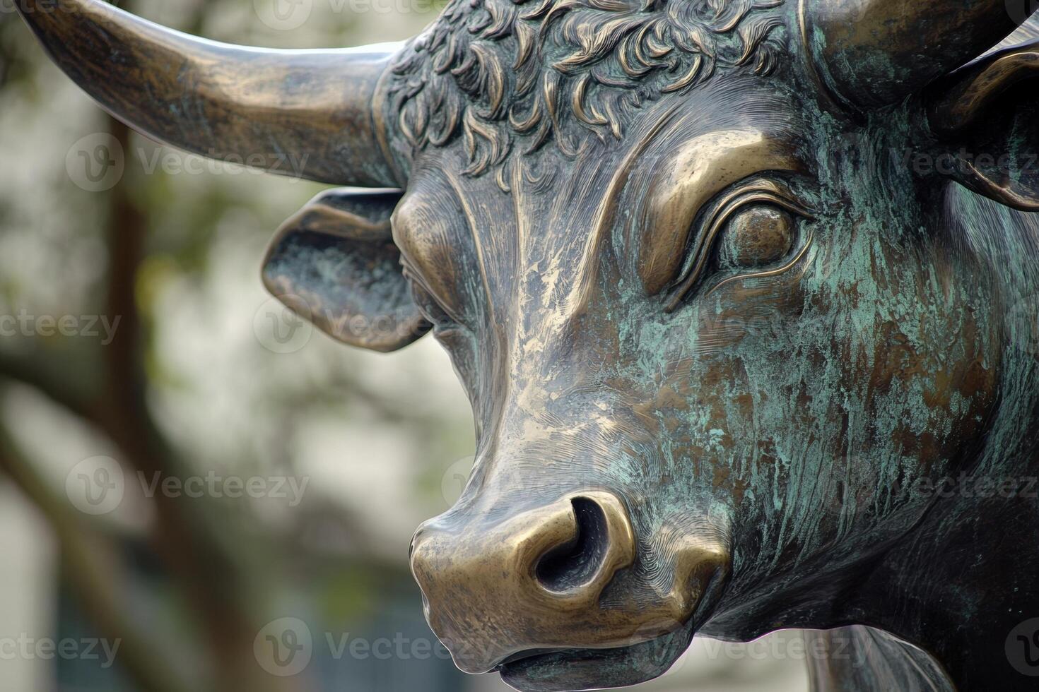 Bronze bull sculpture representing financial prosperity and success photo
