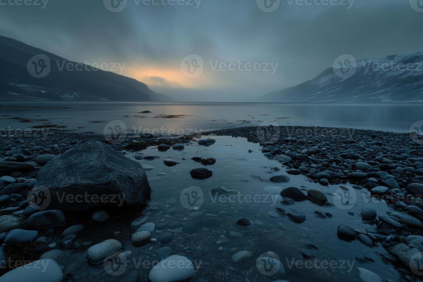 Scenic landscape of aurora borealis illuminating norwegian fjord at twilight photo
