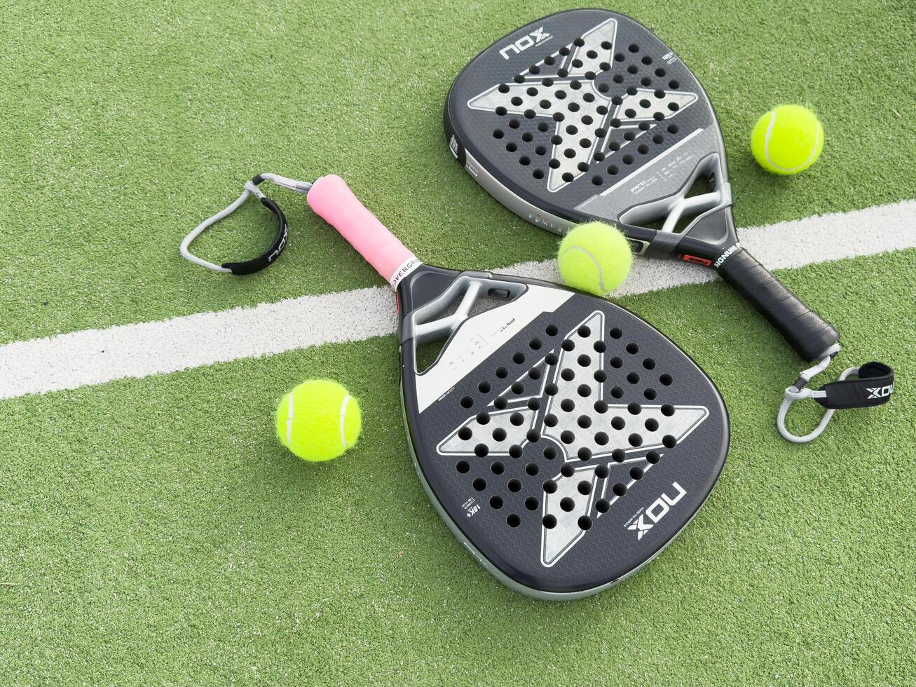 Kyiv, Ukraine, October 23, 2024. padel racket nox on a padel court with a ball photo