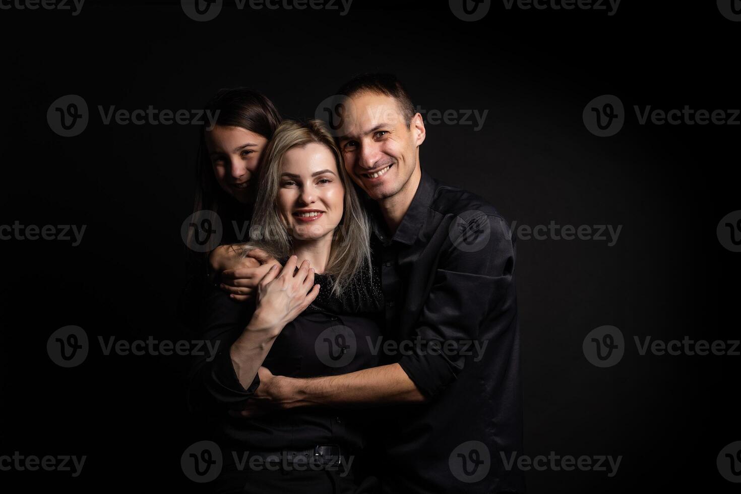 family on a black background photo