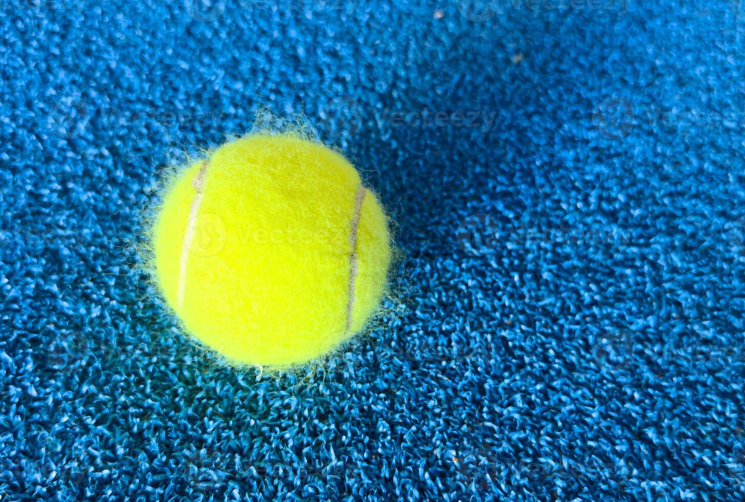 The tennis ball on the padel court photo