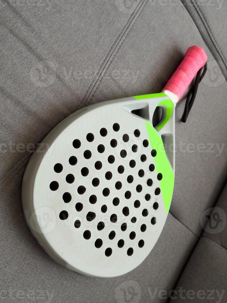 Paddle Tennis Racket, on gray background photo
