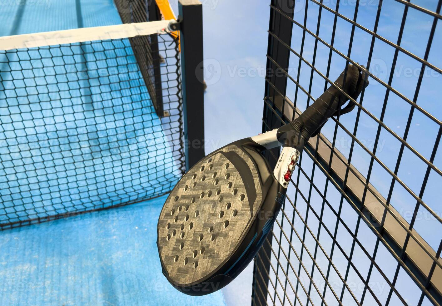 paddle sport on the paddle court, ball, rackets photo