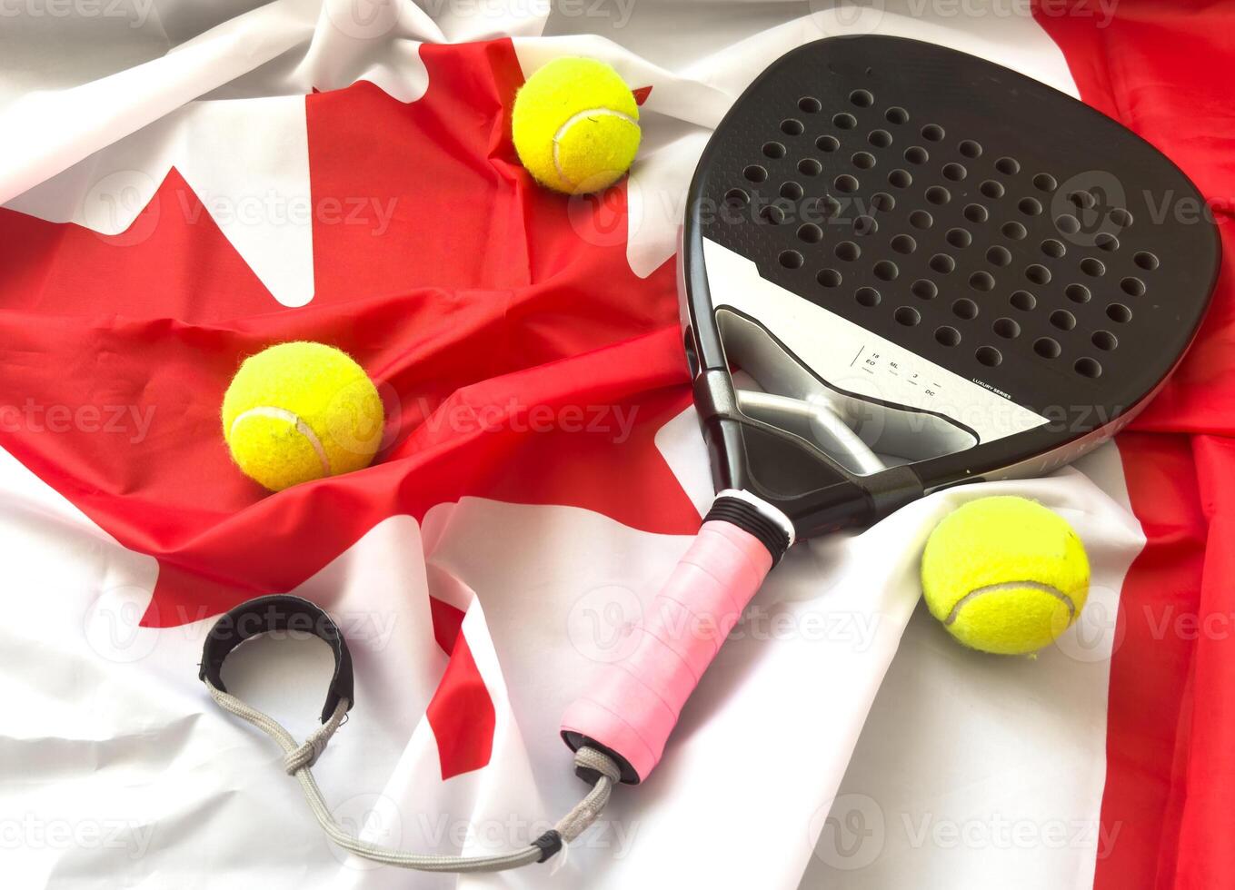 padel tennis racket and canada flag photo